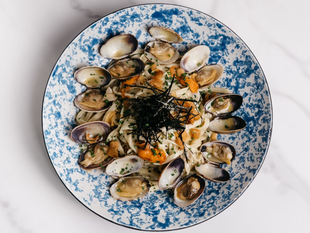 Navy Blue’s spaghetti vongole dish, with clams served over spaghetti with a garnish of seaweed.