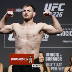 Stipe Miocic poses at UFC 226 weigh-ins.
