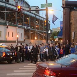6:32 p.m. Larger crowds begin to arrive, at Clark and Addison - 