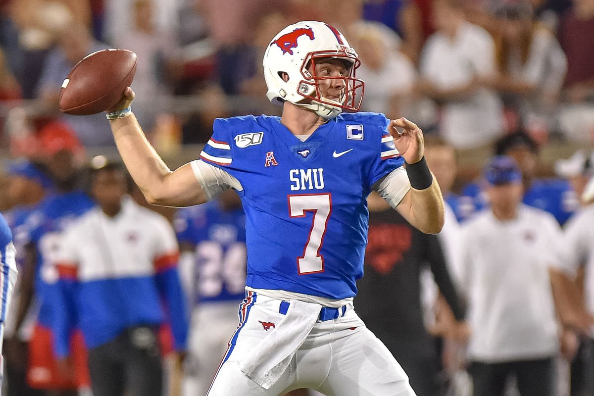 SMU Mustangs quarterback Shane Buechele (7) looks downfield during the second quarter against Tulsa Golden Hurricanes at Gerald J. Ford Stadium. Mandatory Credit: Timothy Flores