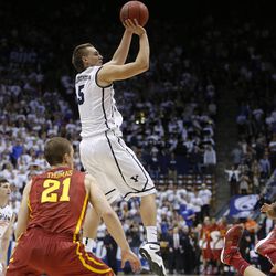 BYU's Kyle Collinsworth puts up a three point attempt for the tie as BYU Wednesday, Nov. 20, 2013 in the Marriott Center. Iowa State defeated BYU 90-88.