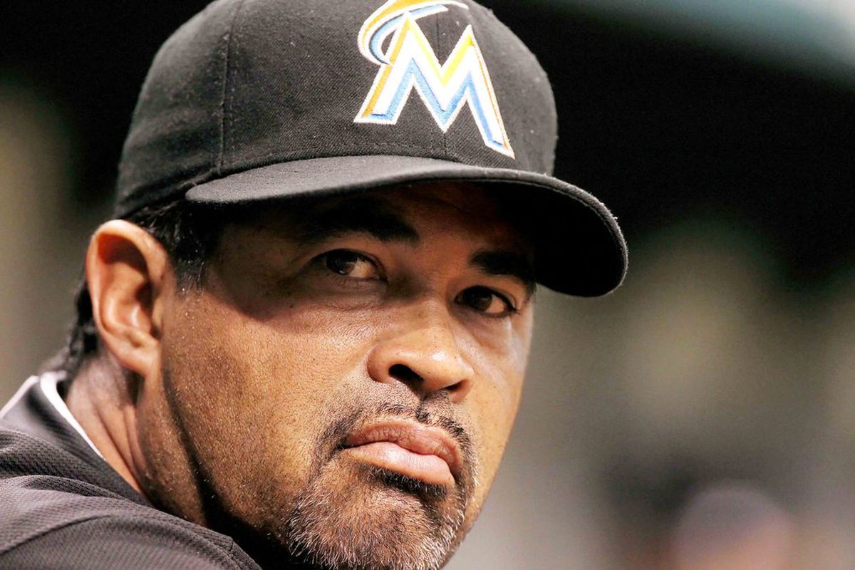 June 15, 2012; St. Petersburg, FL, USA; Miami Marlins manager Ozzie Guillen (13) in the dugout against the Tampa Bay Rays at Tropicana Field. Mandatory Credit: Kim Klement-US PRESSWIRE