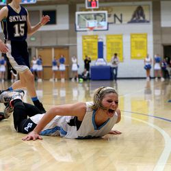 Sky View's 11 Lindsey Jensen screams after diving for a loose ball during the 4A championship game vs. Skyline at Salt Lake Community College on Saturday, Feb. 21, 2015.
