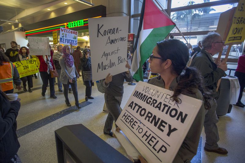 Protestors in an airport.