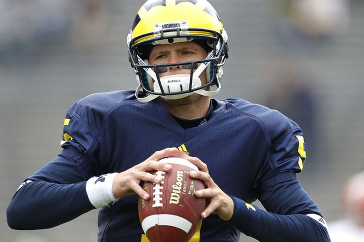 ANN ARBOR MI - SEPTEMBER 25: Tate Forcier #5 of the Michigan Wolverines warms up during the second quarter of the game against Bowling Green on September 25 2010 at Michigan Stadium in Ann Arbor Michigan.  (Photo by Leon Halip/Getty Images)