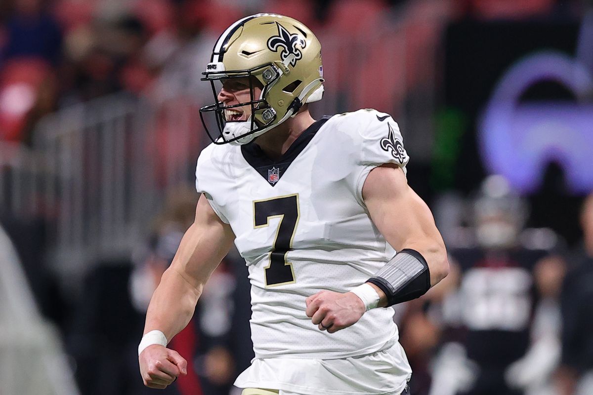 Taysom Hill #7 of the New Orleans Saints celebrates a touchdown during the first quarter in the game against the Atlanta Falcons at Mercedes-Benz Stadium on January 09, 2022 in Atlanta, Georgia.
