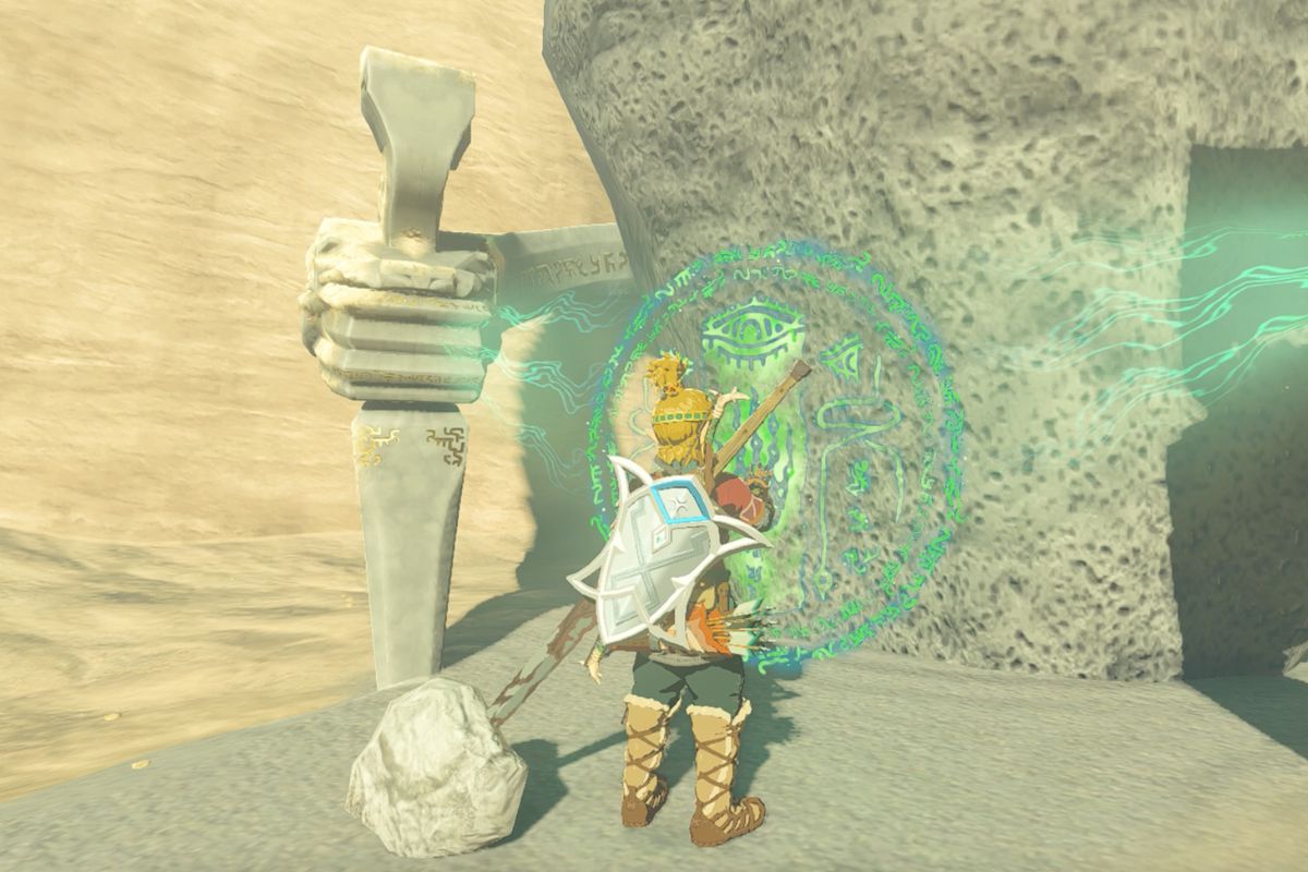 Link stands in front of the entrance to the Mayatat Shrine in Zelda: Tears of the Kingdom.