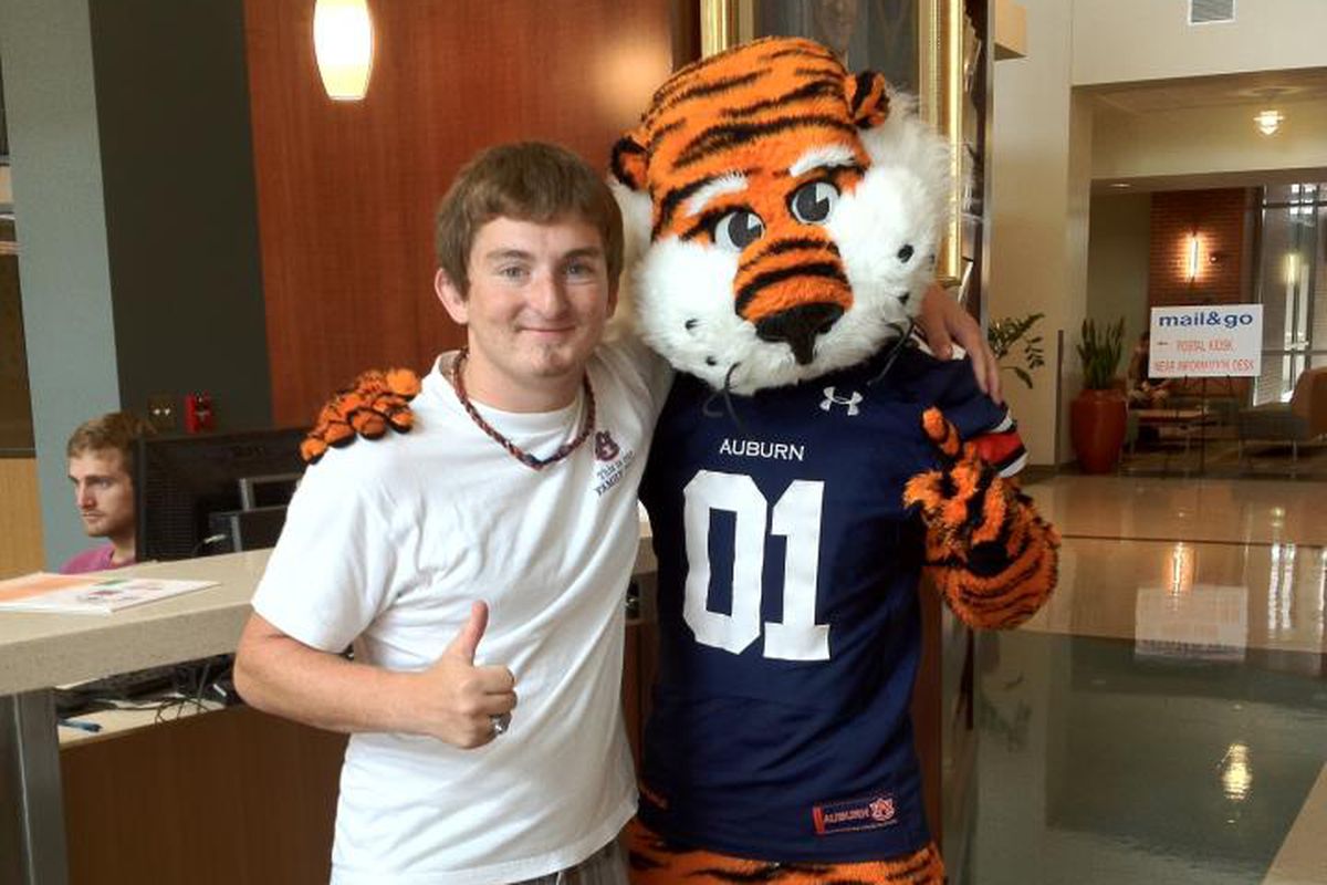 Briles with Auburn mascot Aubie the tiger.