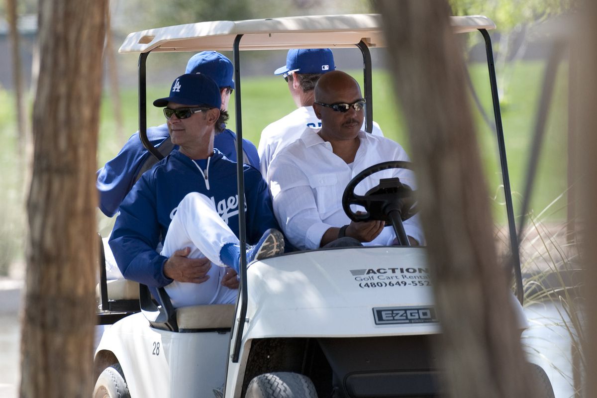 De Jon Watson (right), with Don Mattingly during spring training in 2012.