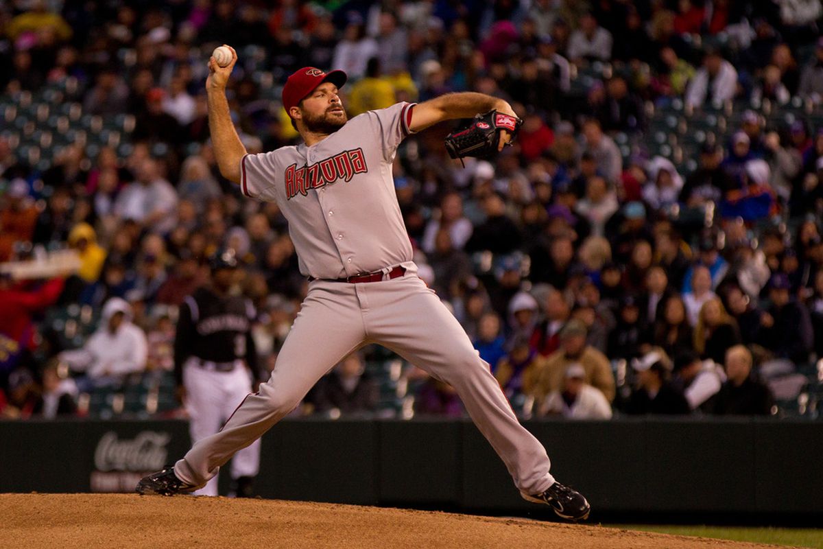 DENVER, CO - APRIL 14:  Starting pitcher Josh Collmenter #55 of the Arizona Diamondbacks works the second inning against the Colorado Rockies at Coors Field on April 14, 2012 in Denver, Colorado.  (Photo by Justin Edmonds/Getty Images)
