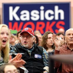 Crowd members cheer as they listen to Ohio Gov. John Kasich speak in the Grande Ballroom at UVU Friday, March 18, 2016.