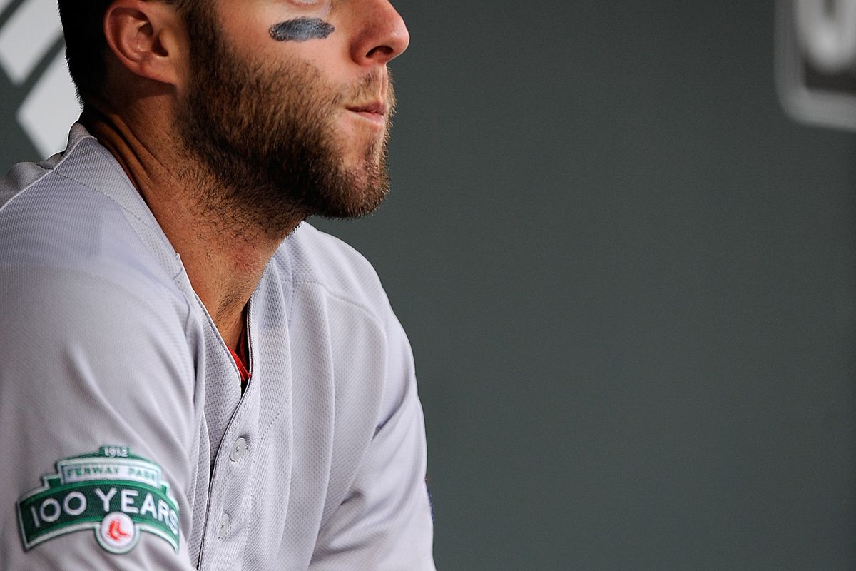 BALTIMORE, MD: Dustin Pedroia #15 of the Boston Red Sox looks on before a game against the Baltimore Orioles at Oriole Park at Camden Yards in Baltimore, Maryland.  (Photo by Patrick McDermott/Getty Images)