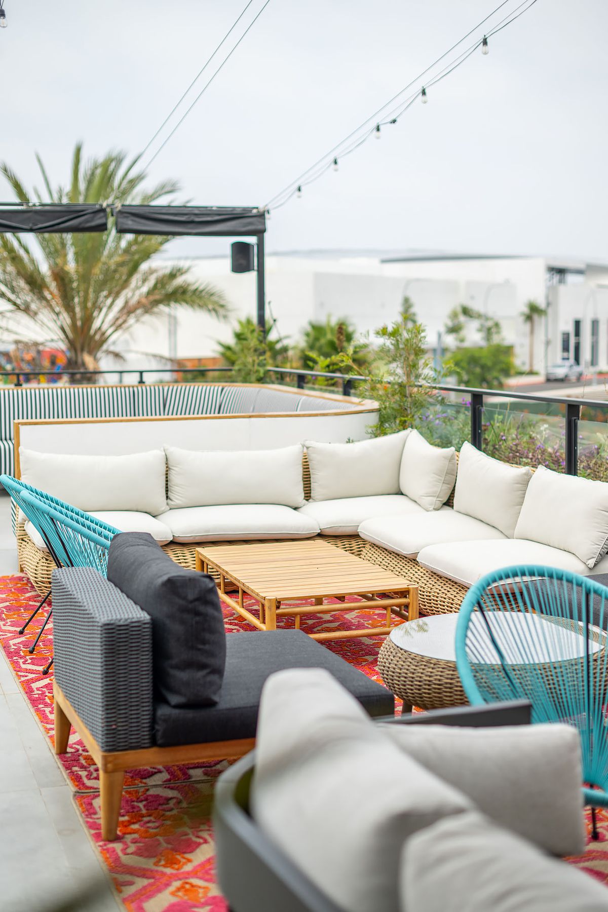 Rooftop seating lounge at Cork &amp; Batter restaurant in Inglewood, California.
