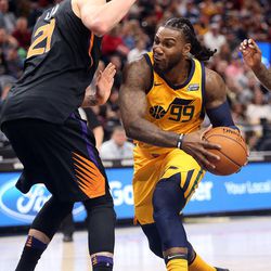 Utah Jazz forward Jae Crowder (99) moves around Phoenix Suns center Alex Len (21) during a basketball game at the Vivint Smart Home Arena in Salt Lake City on Wednesday, Feb. 14, 2018. Jazz won 107-97.