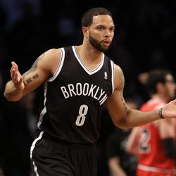 Brooklyn Nets' Deron Williams reacts after scoring against the Chicago Bulls during the first quarter of Game 1 of a first-round series of the NBA basketball playoffs, Saturday, April 20, 2013, in New York. (AP Photo/Seth Wenig)