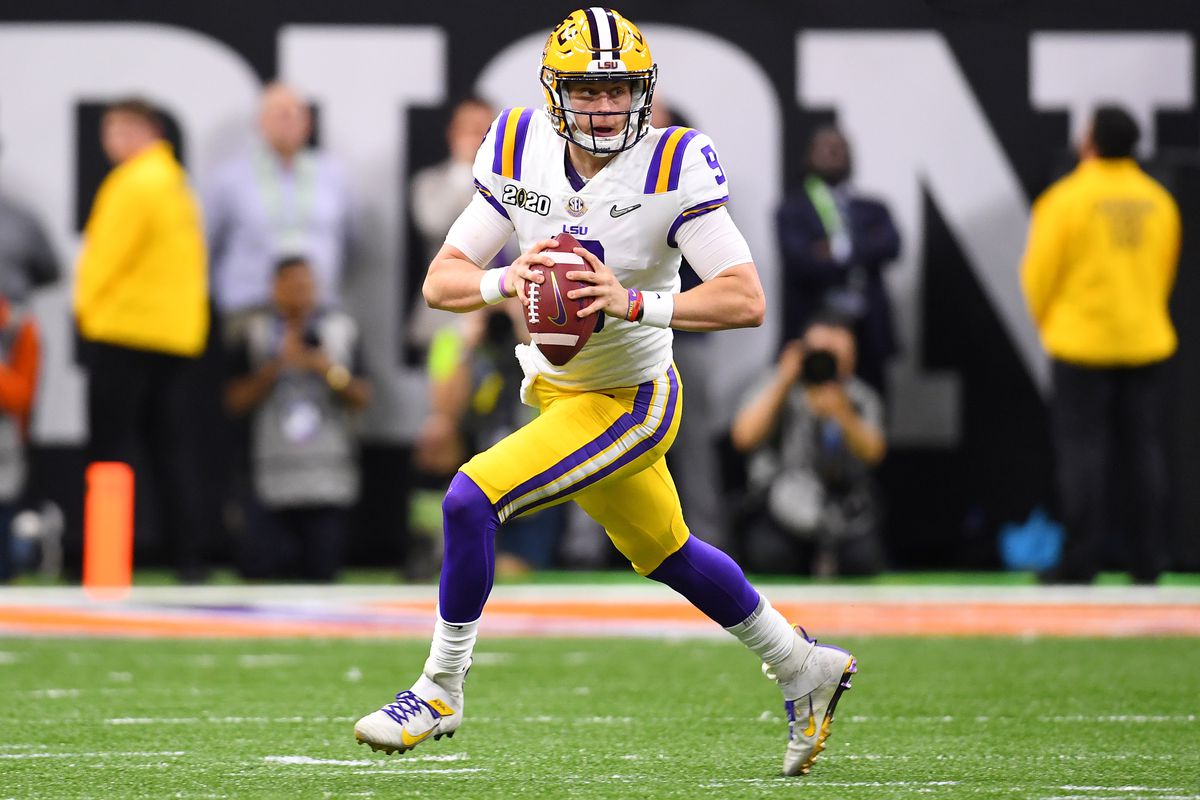 Joe Burrow of the LSU Tigers eludes the rush from the Clemson Tigers during the College Football Playoff National Championship held at the Mercedes-Benz Superdome on January 13, 2020 in New Orleans, Louisiana.