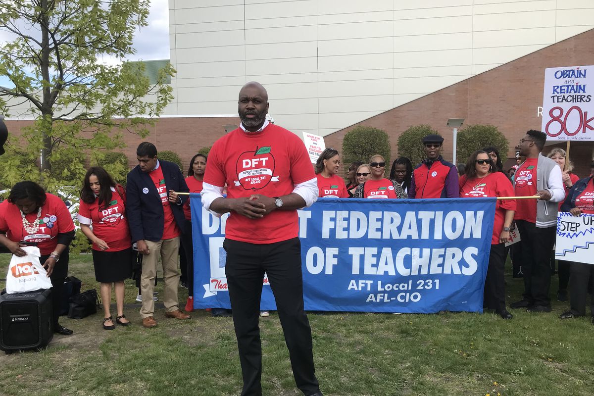 Terrence Martin, president of the Detroit Federation of Teachers, speaks during a demonstration outside Renaissance High School