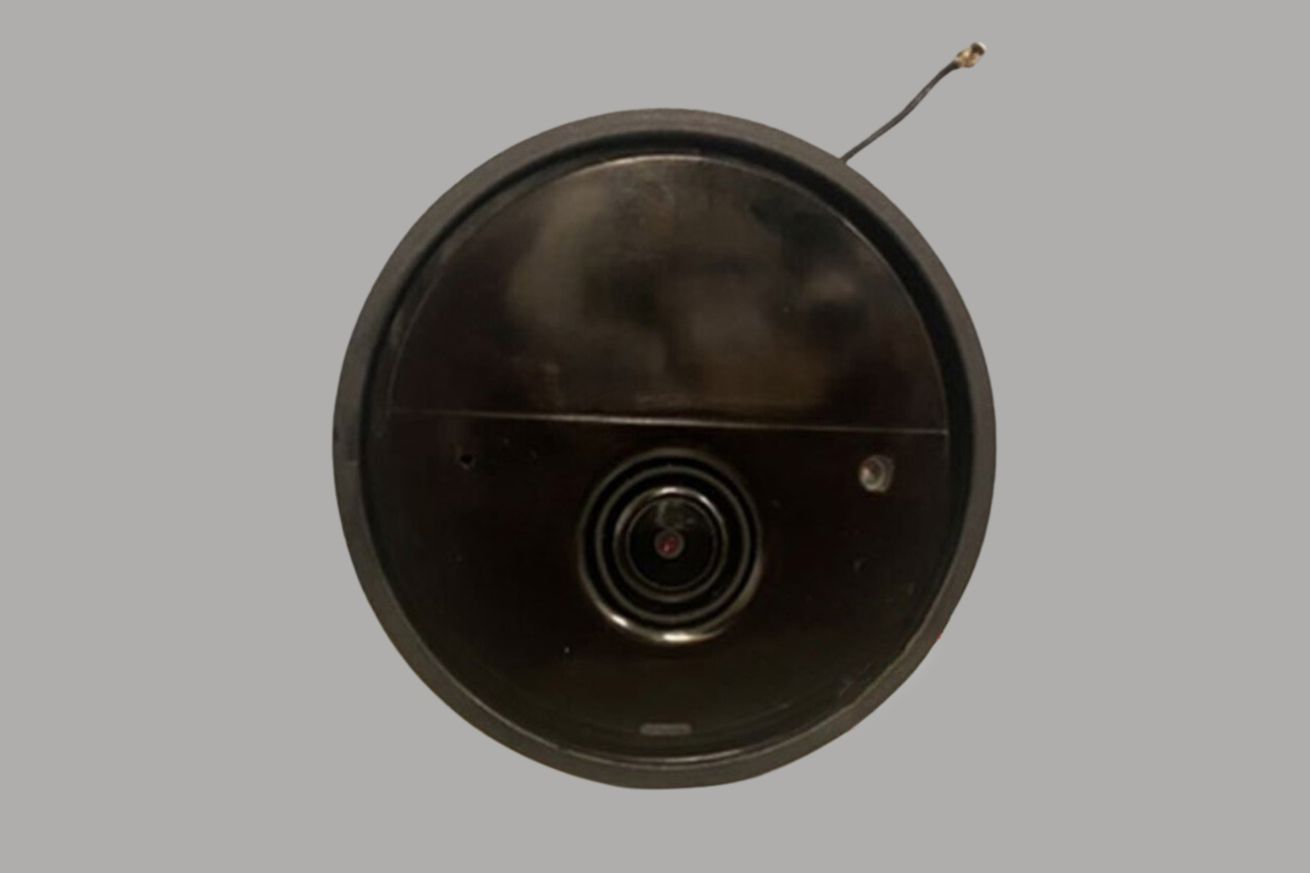A cutout of the new Philips Hue security camera against a plain gray backdrop.