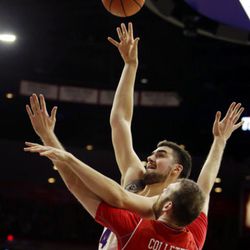 Arizona center Dusan Ristic (14) shoots over Utah forward David Collette in the second half during an NCAA college basketball game, Saturday, Jan. 27, 2018, in Tucson, Arizona.