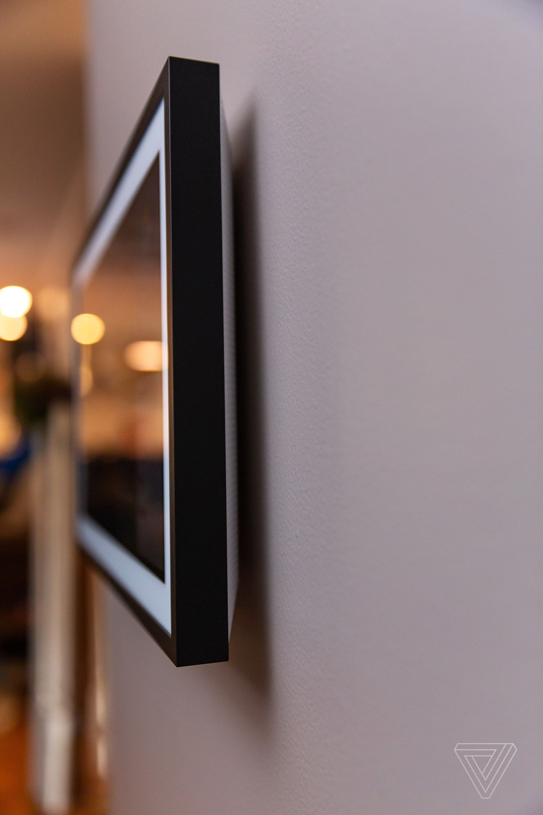 A slimline design allows room for speakers without a super bulky form factor when mounted on the wall.