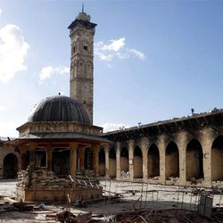 This undated citizen journalism image provided by Aleppo Media Center AMC which has been authenticated based on its contents and other AP reporting, shows the minaret of a famed 12th century Umayyad mosque before it was destroyed by the shelling, in the northern city of Aleppo, Syria. The minaret of a famed 12th century Sunni mosque in the northern Syrian city of Aleppo was destroyed Wednesday, April; 24, 2013, leaving the once-soaring stone tower a pile of rubble and twisted metal scattered in the tiled courtyard. President Bashar Assad's regime and anti-government activists traded blame for the attack against the Umayyad mosque, which occurred in the heart Aleppo's walled Old City, a UNESCO World Heritage site. It was the second time in just over a week that a historic Sunni mosque in Syria has been seriously damaged. (AP Photo/Aleppo Media Center, AMC)
