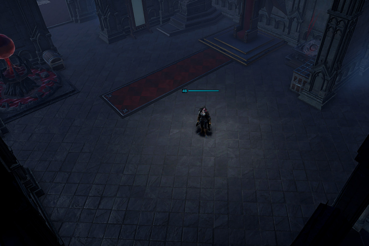 A vampire stands in a mostly empty castle with a throne and some carpet
