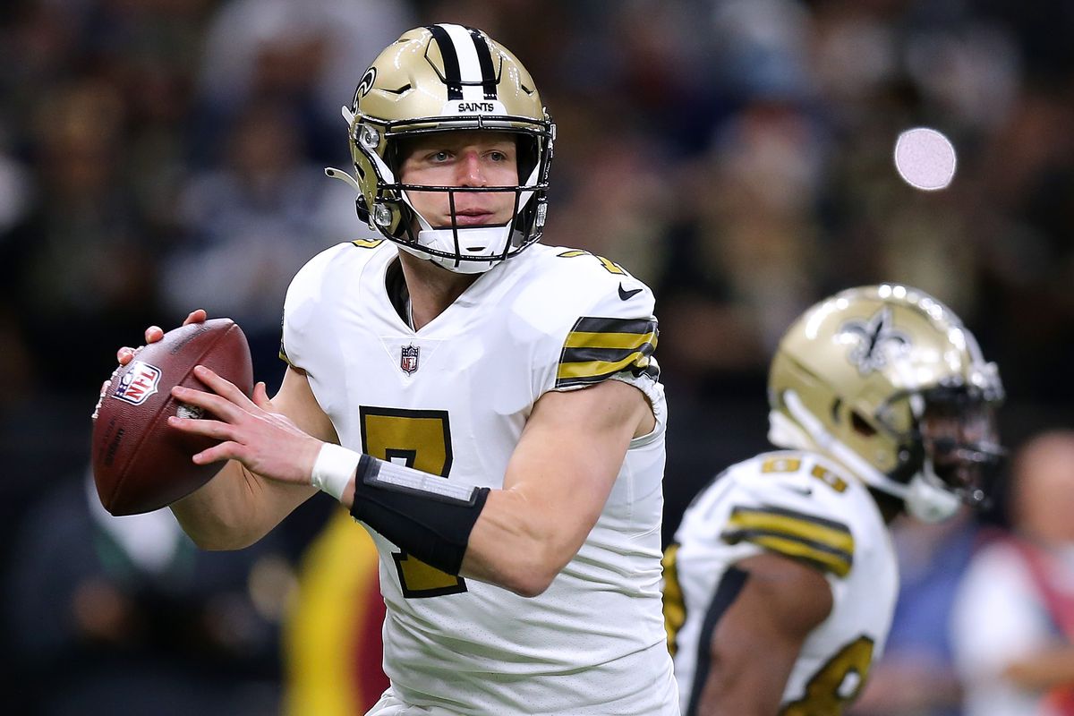 Taysom Hill #7 of the New Orleans Saints throws the ball against the Dallas Cowboys during a game at the the Caesars Superdome on December 02, 2021 in New Orleans, Louisiana.