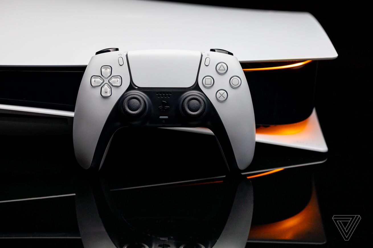 Image of a PlayStation DualSense controller in front of an original PlayStation 5.