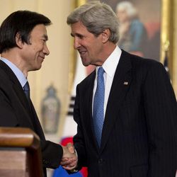 U.S. Secretary of State John Kerry, right, shakes hands with South Korean Foreign Minister Yun Byung-Se, at the State Department in Washington, on Tuesday, April 2, 2013. 