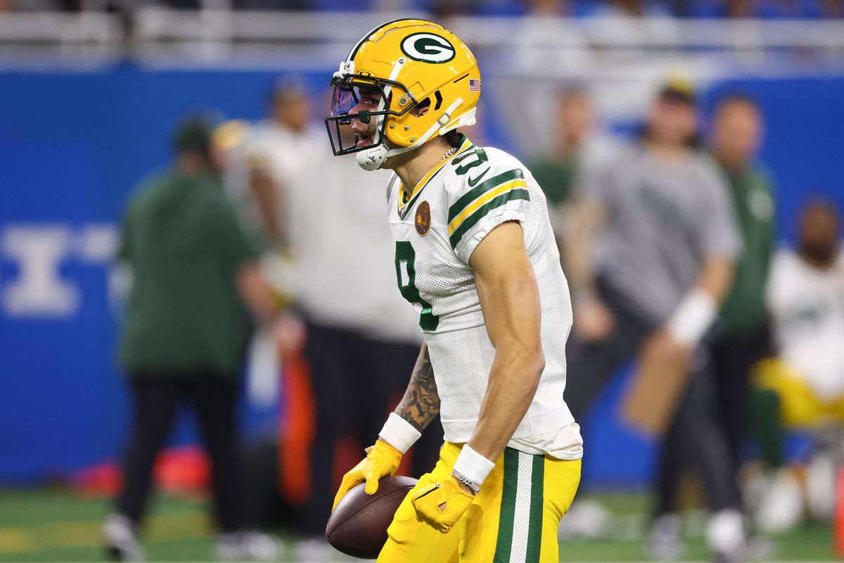 Christian Watson of the Green Bay Packers reacts after catching a pass against the Detroit Lions during the first quarter of the game at Ford Field on November 23, 2023 in Detroit, Michigan.