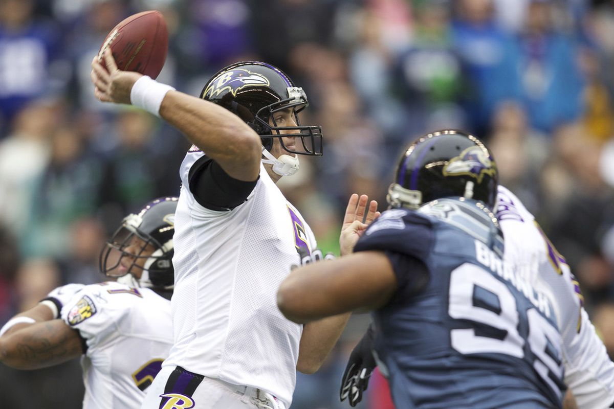 SEATTLE, WA - NOVEMBER 13: Quarterback Joe Flacco #5 passes the ball during play against the Baltimore Ravens at CenturyLink Field on November 13, 2011 in Seattle, Washington. (Photo by Stephen Brashear /Getty Images)