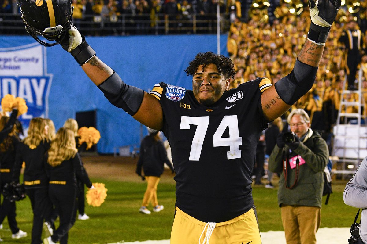 Iowa Hawkeyes offensive lineman Tristan Wirfs celebrates after the San Diego County Credit Union Holiday Bowl football game between the USC Trojans and the Iowa Hawkeyes on December 27, 2019 at SDCCU Stadium in San Diego, California.