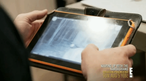 GIF of Cutler swiping through deer pictures on his iPad