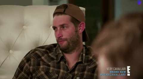 GIF of Jay Cutler shaking his head now and moving his tongue around his mouth