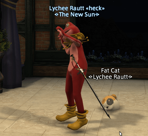 A character dances in a red frog suit while a Fat Cat watches