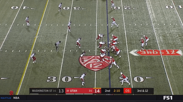 QB Tyler Huntley avoids pressure while keeping his eyes downfield; Huntley makes a nice throw to WR Solomon Enis.