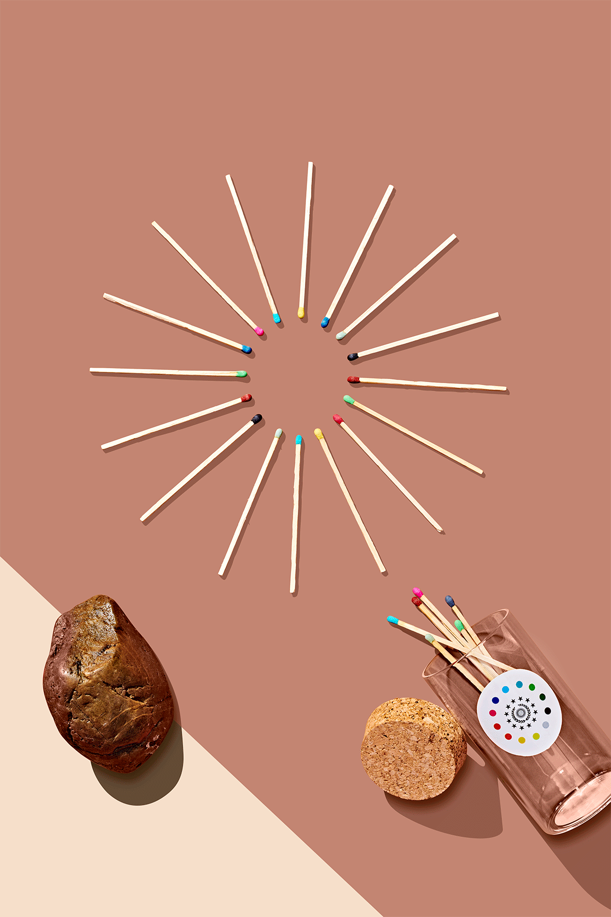 A glass jar of matches with multicolored heads sits next to a circular pattern of matches which appear and disappear one by one. This is part of the 2019 Holiday Gift Guide for Curbed. This is an animated gif.