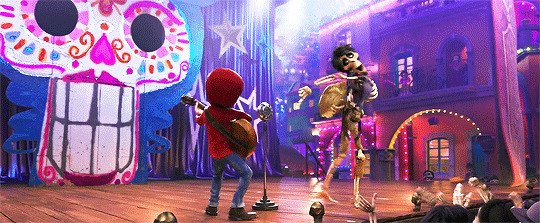 Miguel and Hector from Disney’s “Coco” dance and sing before a cheering crowd. The animation is fun and light-hearted as the characters move with and ease and fluidity that personifies the importance of music in their lives.