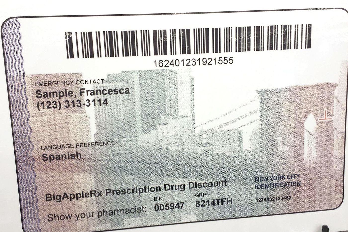 A sample IDNYC card touts its prescription drug discount on the back.