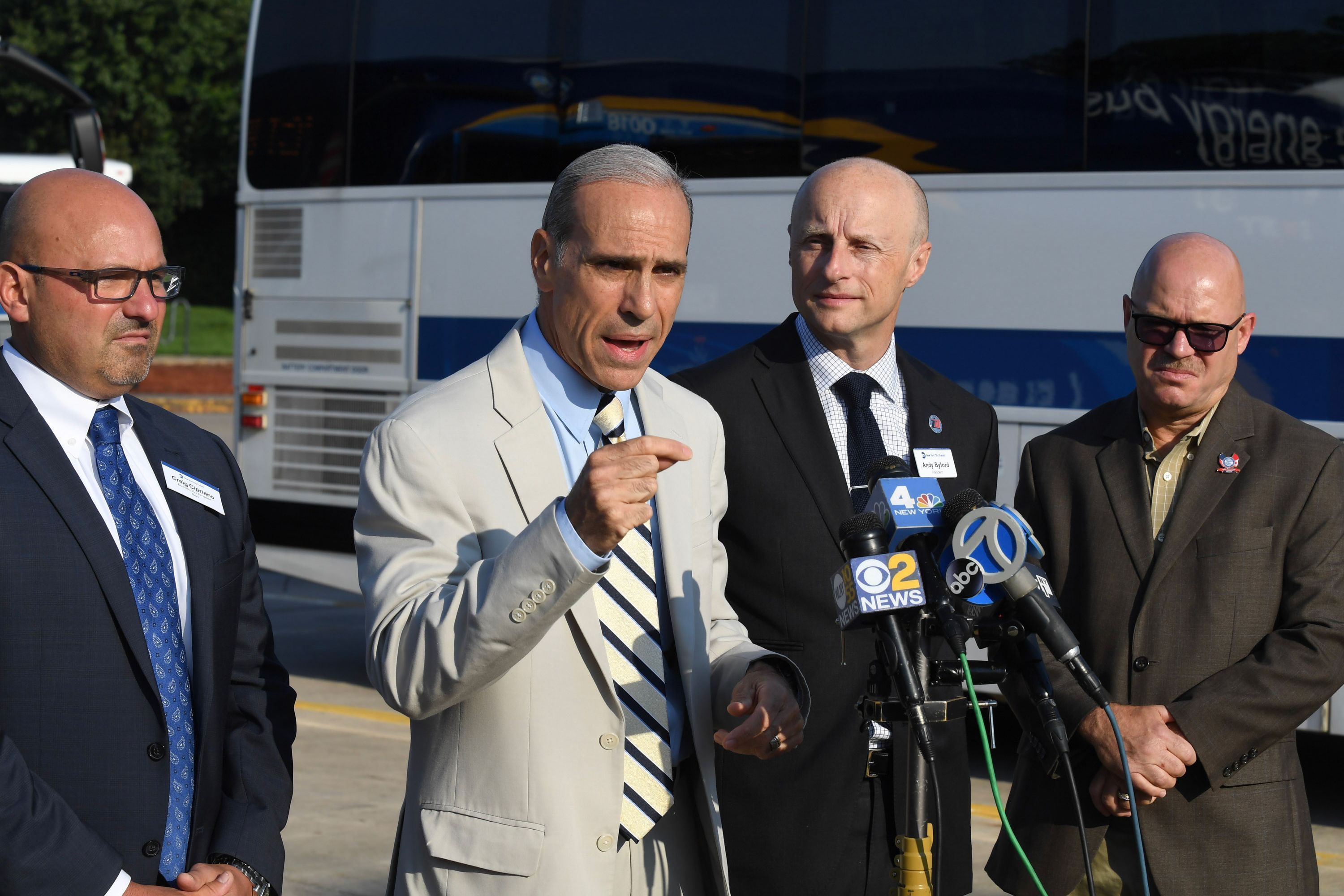 Staten Island Borough President James Oddo, speaks with MTA and union officials at the Eltingville Transit Center in August 2019.