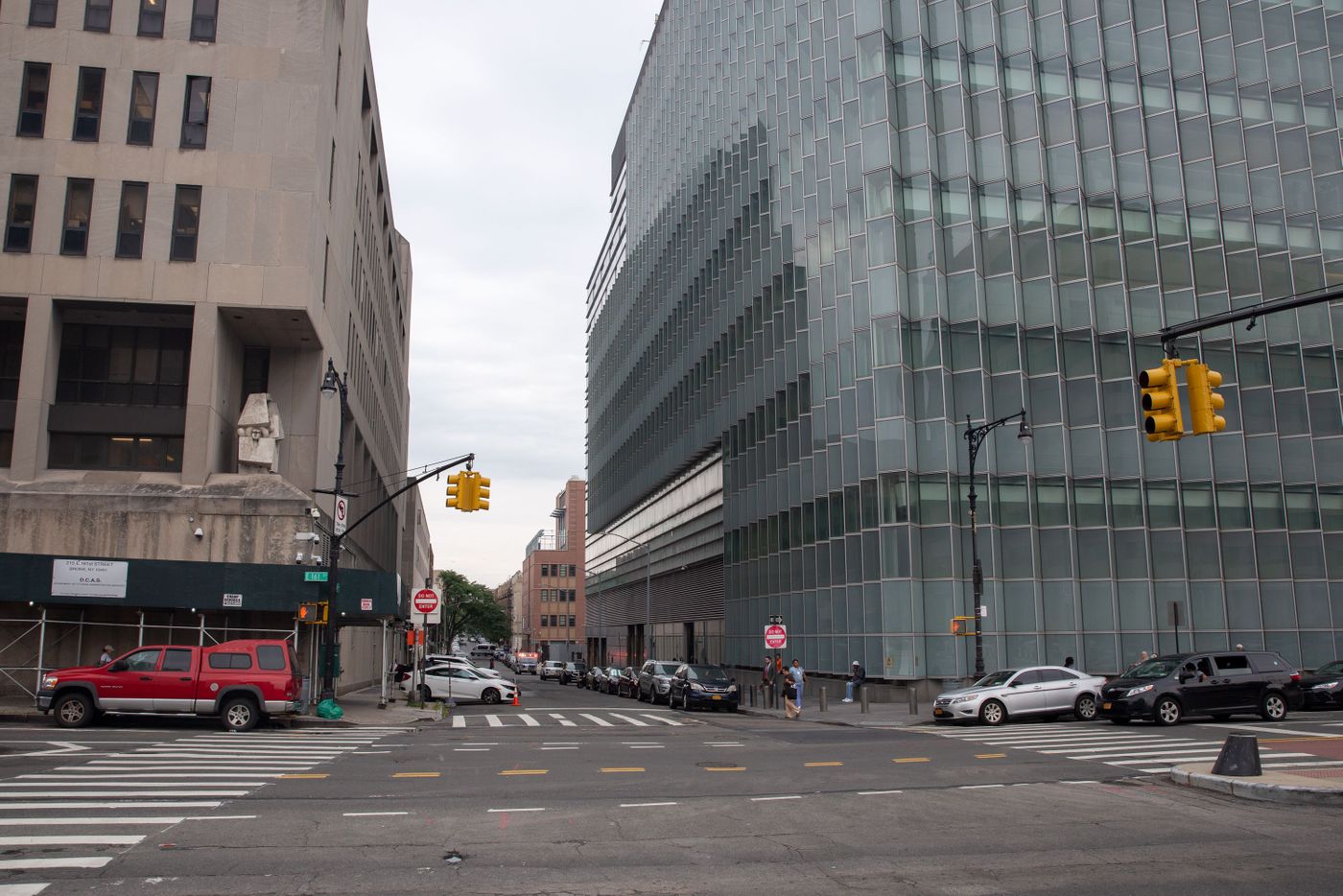 Bronx Family Court is in The Bronx Criminal Court building (left), across the street from The Bronx County Hall of Justice (right).