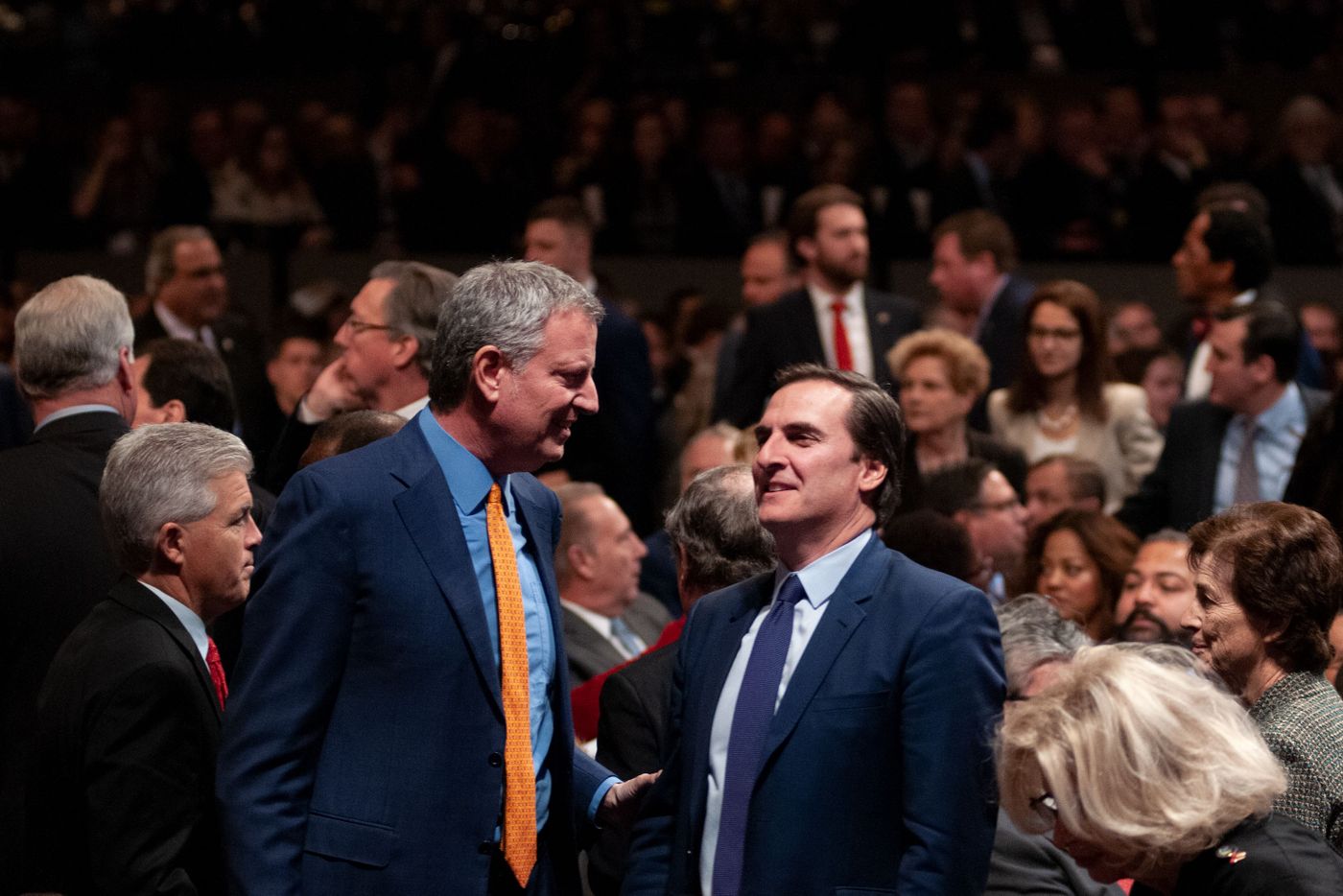 Mayor Bill de Blasio speaks with State Sen. Mike Gianaris (D-Queens) during the 2020 State of the State address in Albany, Jan. 8, 2020.