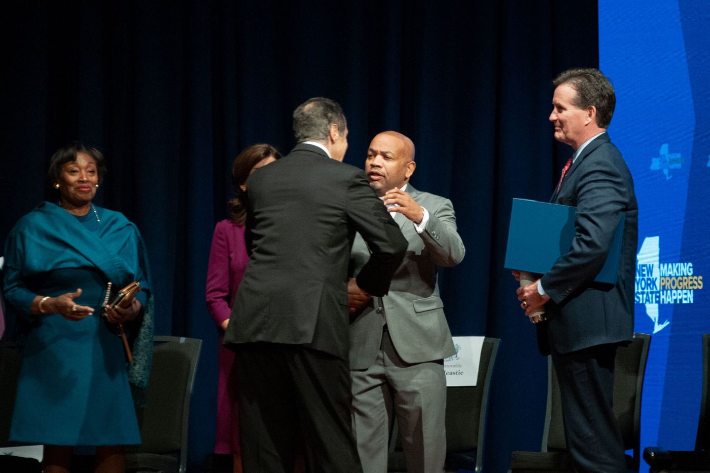 Gov. Andrew Cuomo embraces Assembly Speaker Carl Heastie after delivering his 2020 State of the State address in Albany, Jan. 8, 2020.