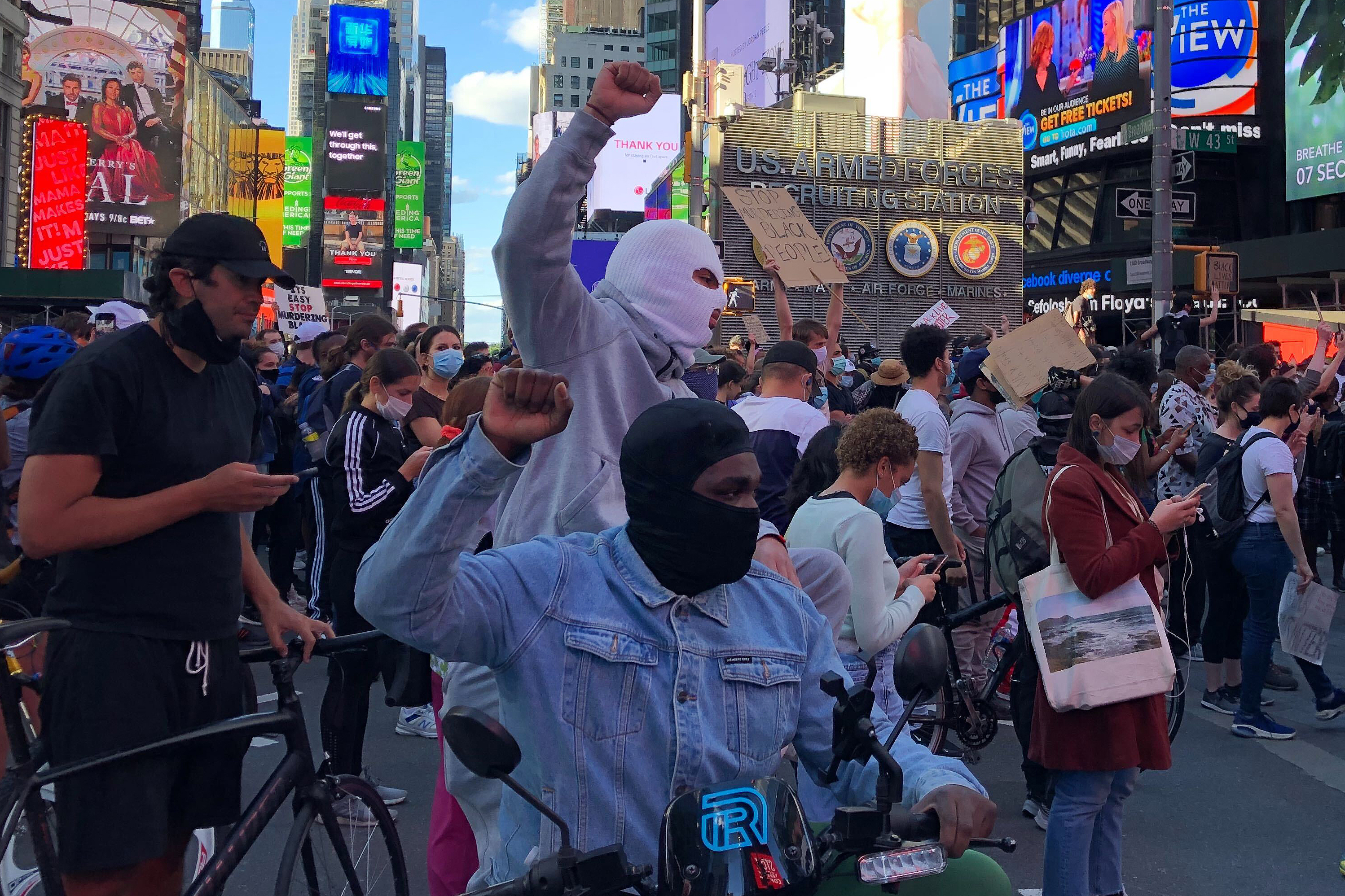 Protesters march through Time Square on May 31, 2020.