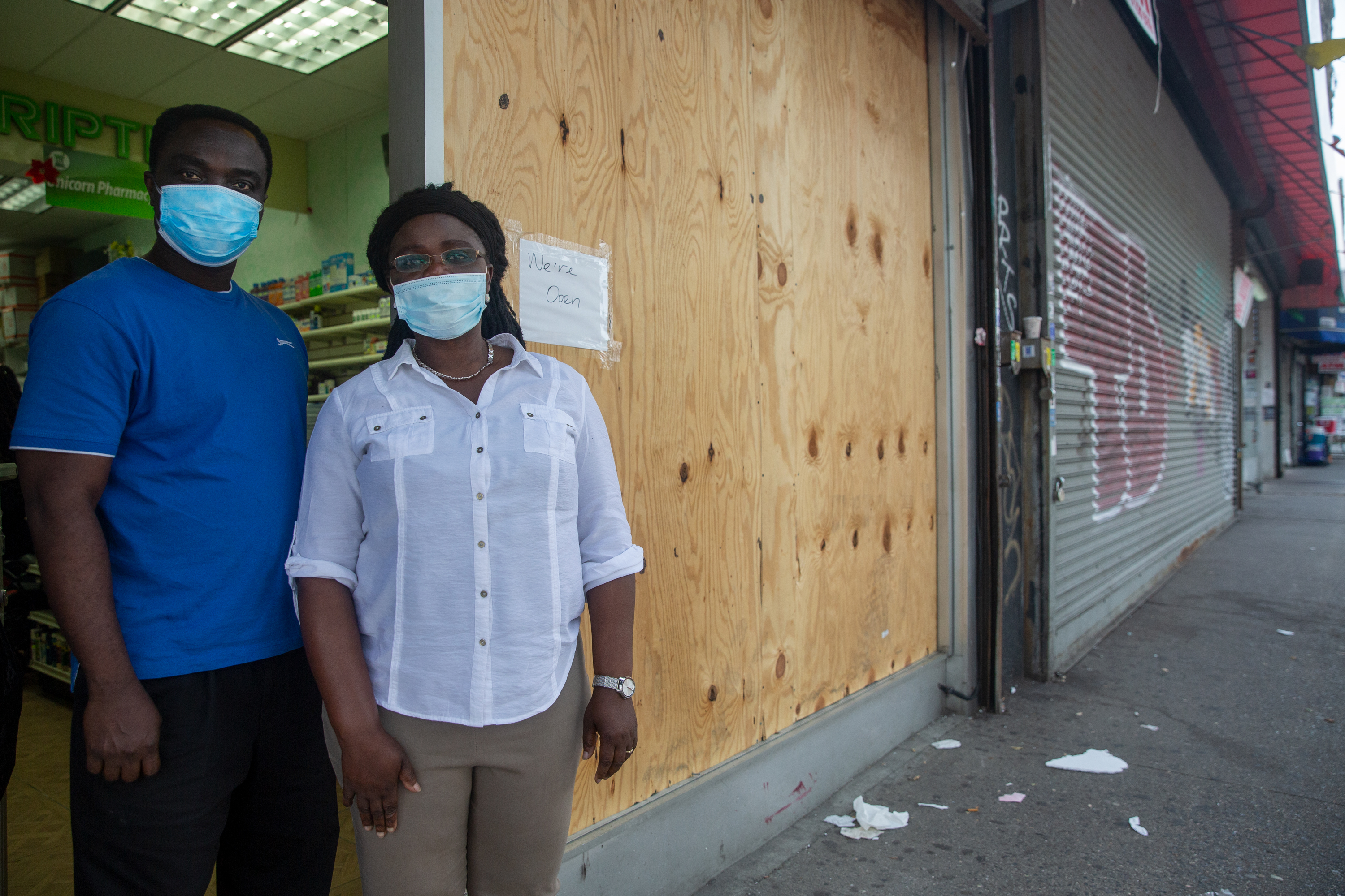 Foster and Beatrice Akuoko outside their Bronx pharmacy
