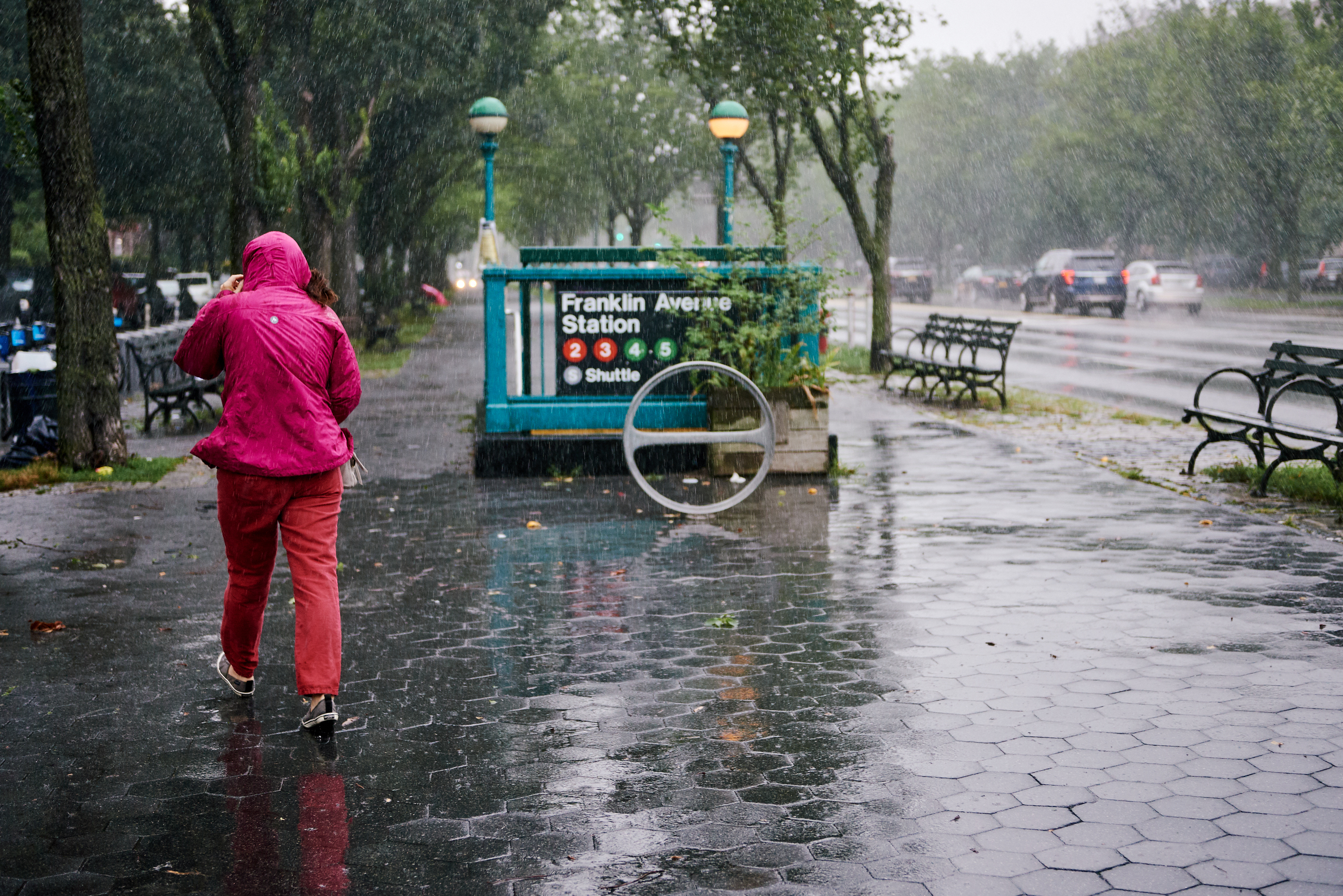 A few people braved the wind and rain on Eastern Parkway in Crown Heights, Brooklyn during Tropical Storm Isaias, Aug. 4, 2020