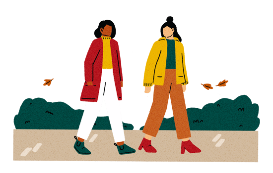two people walking on a fall day