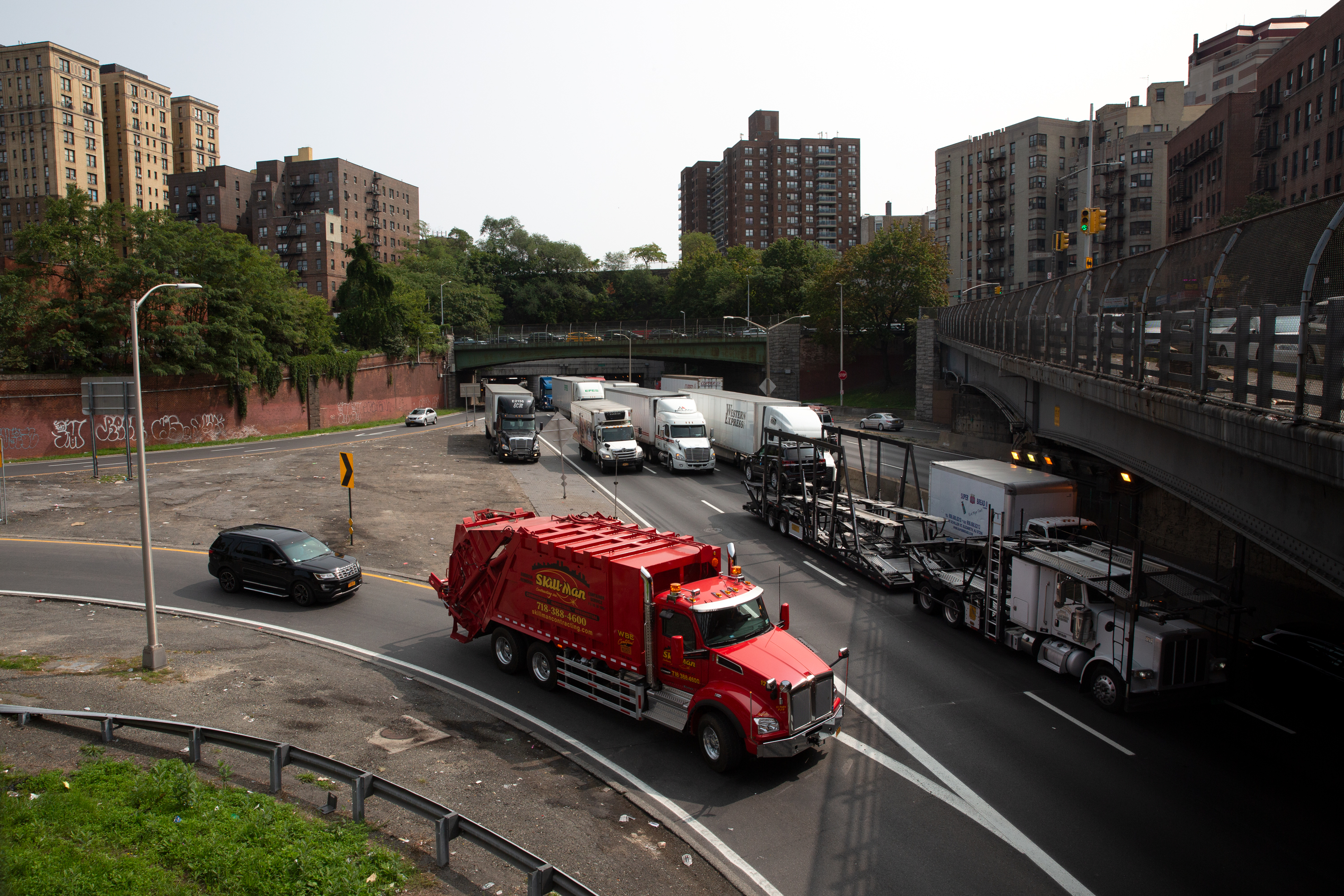 Trucks barrel down the Cross Bronx Expressway near Jerome Avenue, Sept. 15, 2020.