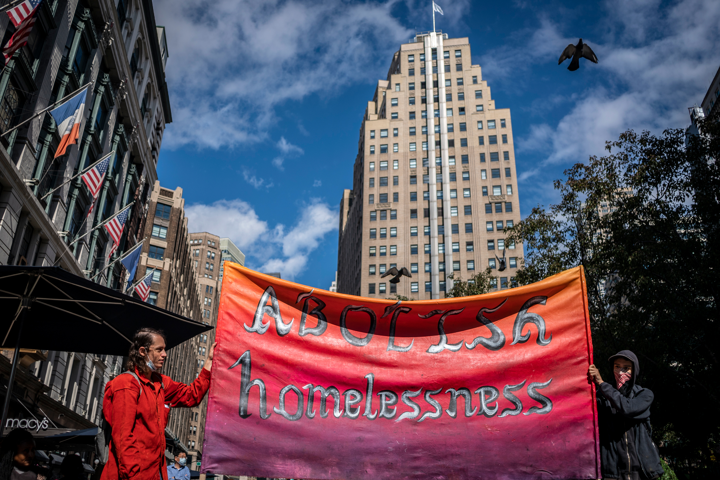Advocates draw attention in Herald Square to increased struggles for homeless people during the coronavirus outbreak, Oct. 2, 2020.