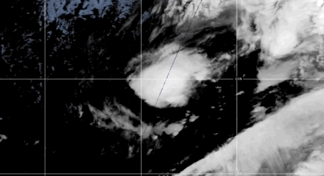 A satellite view of Subtropical Storm Theta spooling up in the Atlantic Ocean.